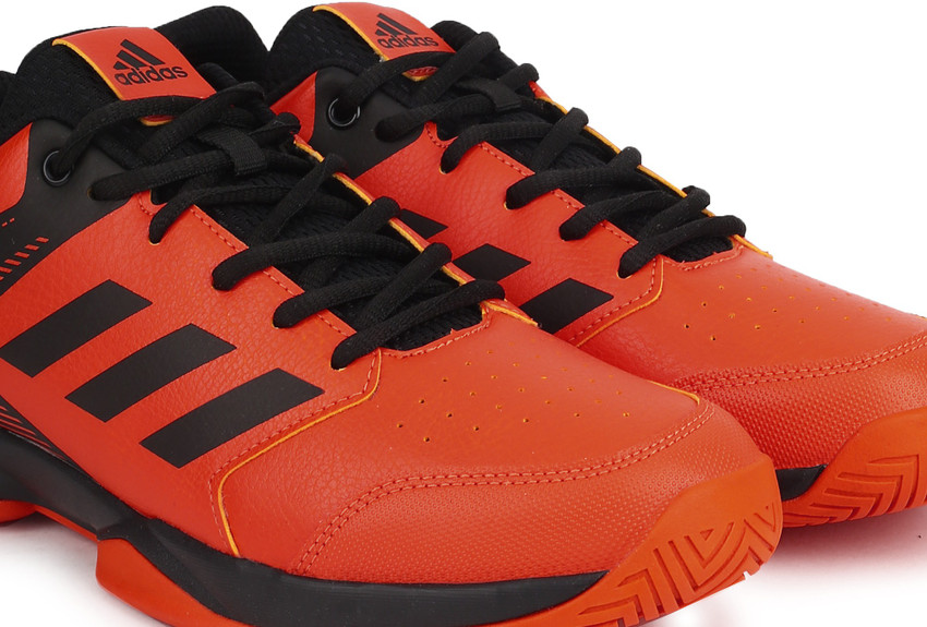 Orange adidas 2025 tennis shoes
