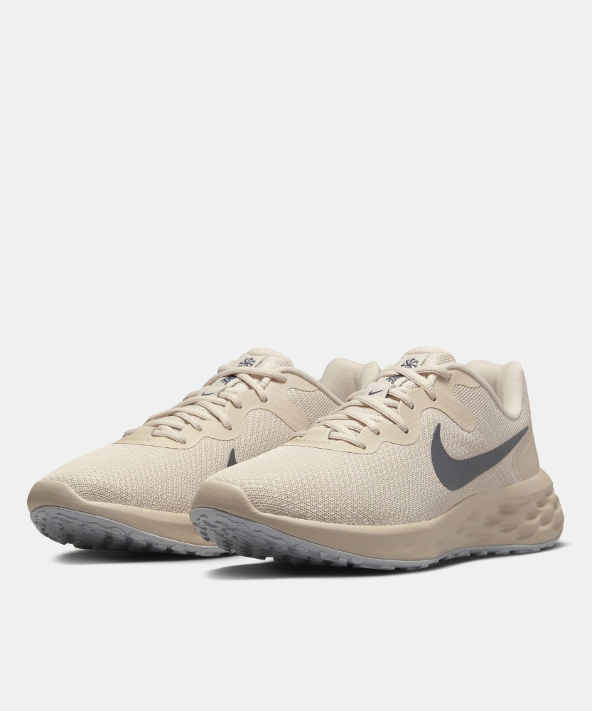 Nike tan 2024 running shoes