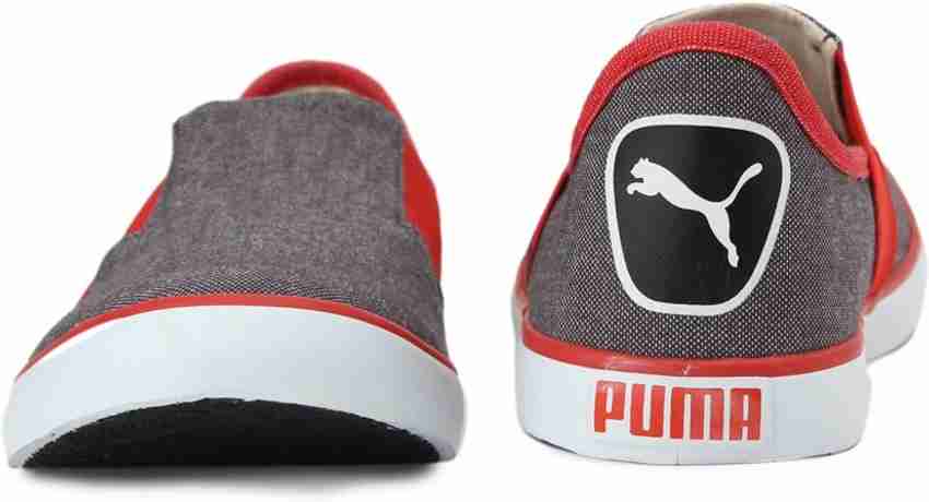 Puma lazy slip on sneakers orange sale