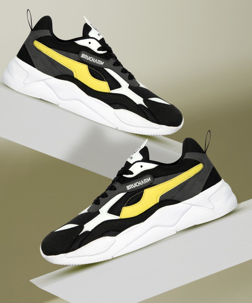 Nike tiger shop yellow running shoes