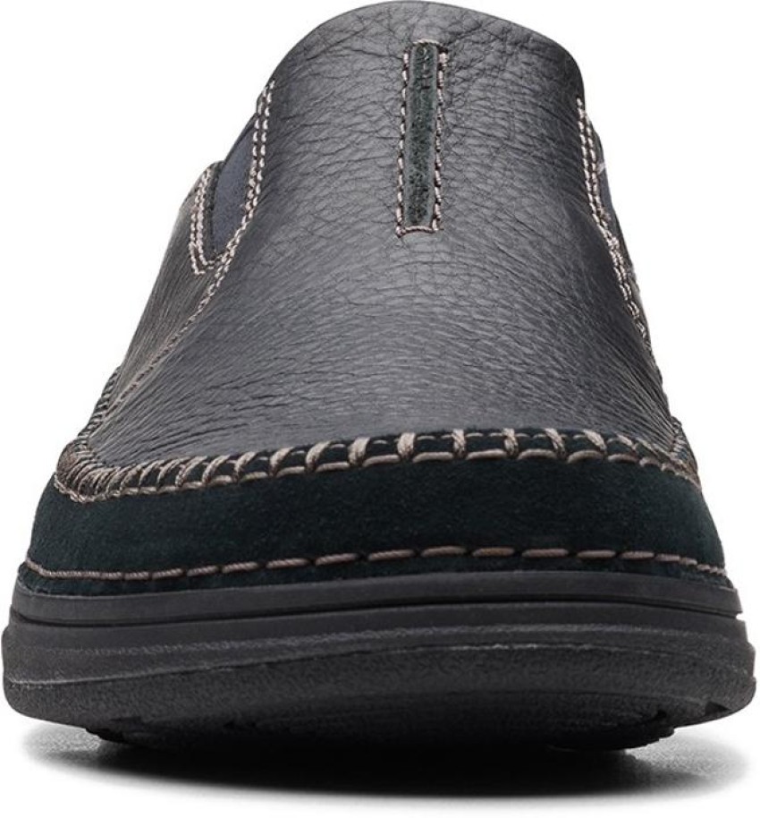 Clarks black slip on sale on