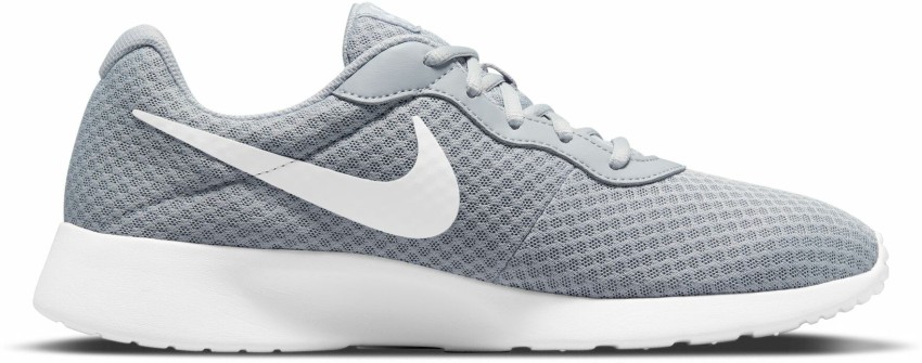 Nike tanjun shop grey sneakers