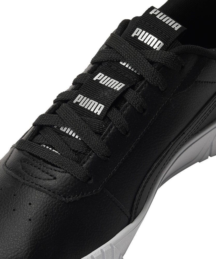 Puma carina leather on sale trainers ladies black