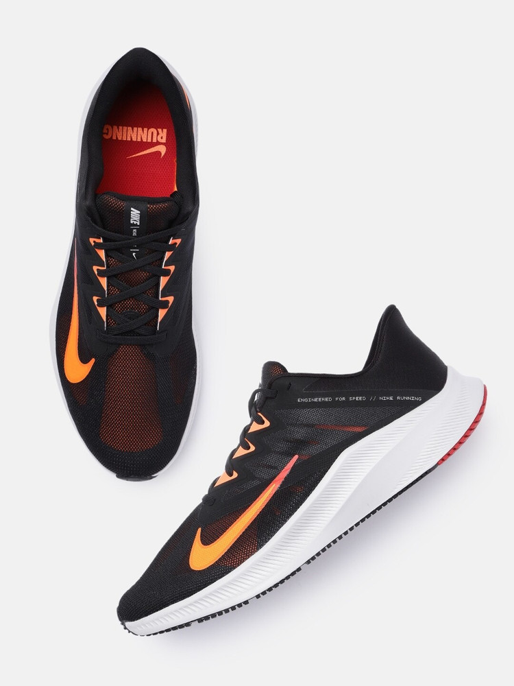 nike running quest 3 trainers in black