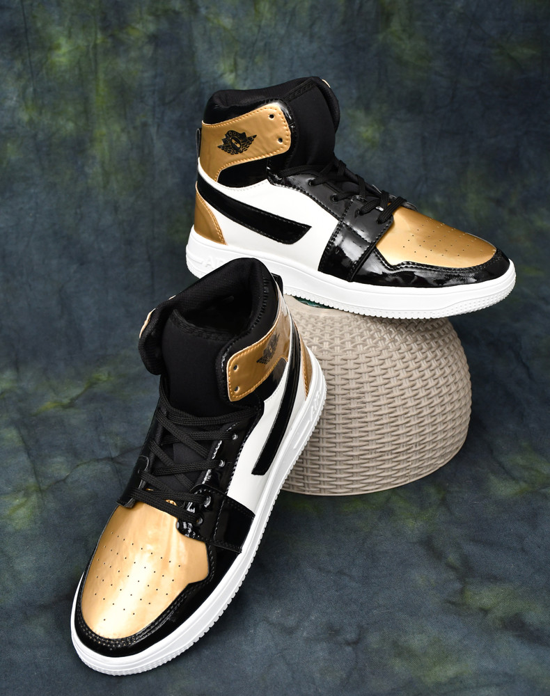Black and gold discount jordans high tops