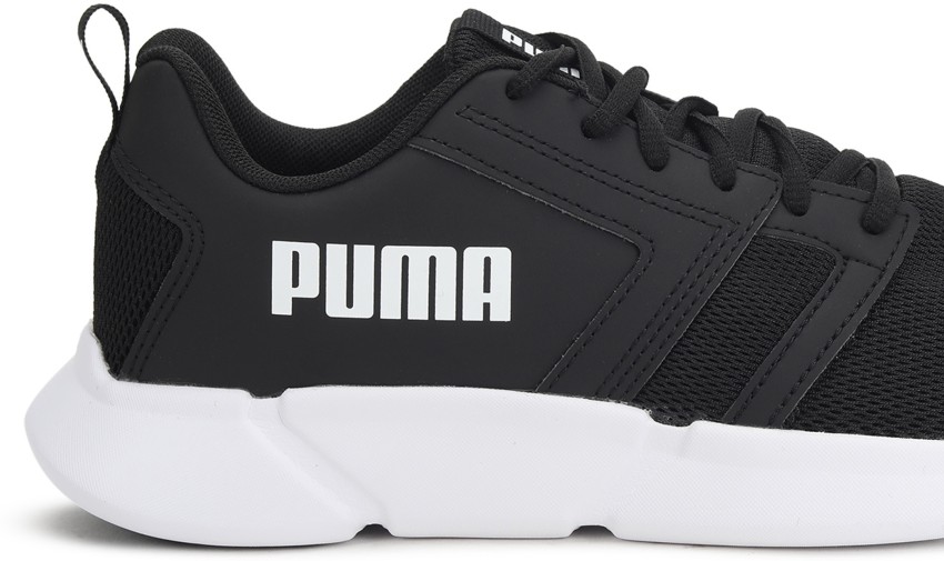 Puma black sale white shoes