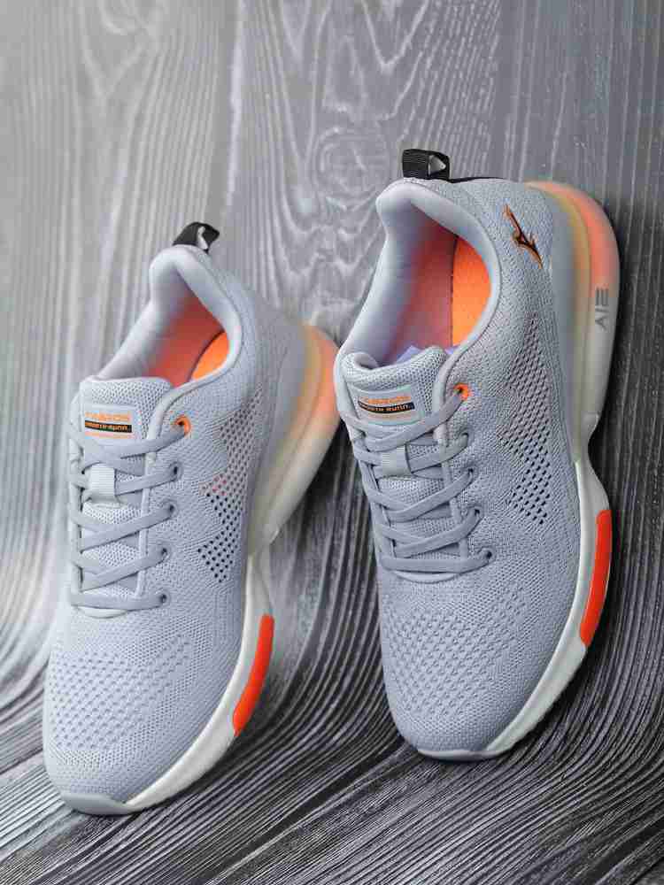 Nike gray on sale and orange shoes