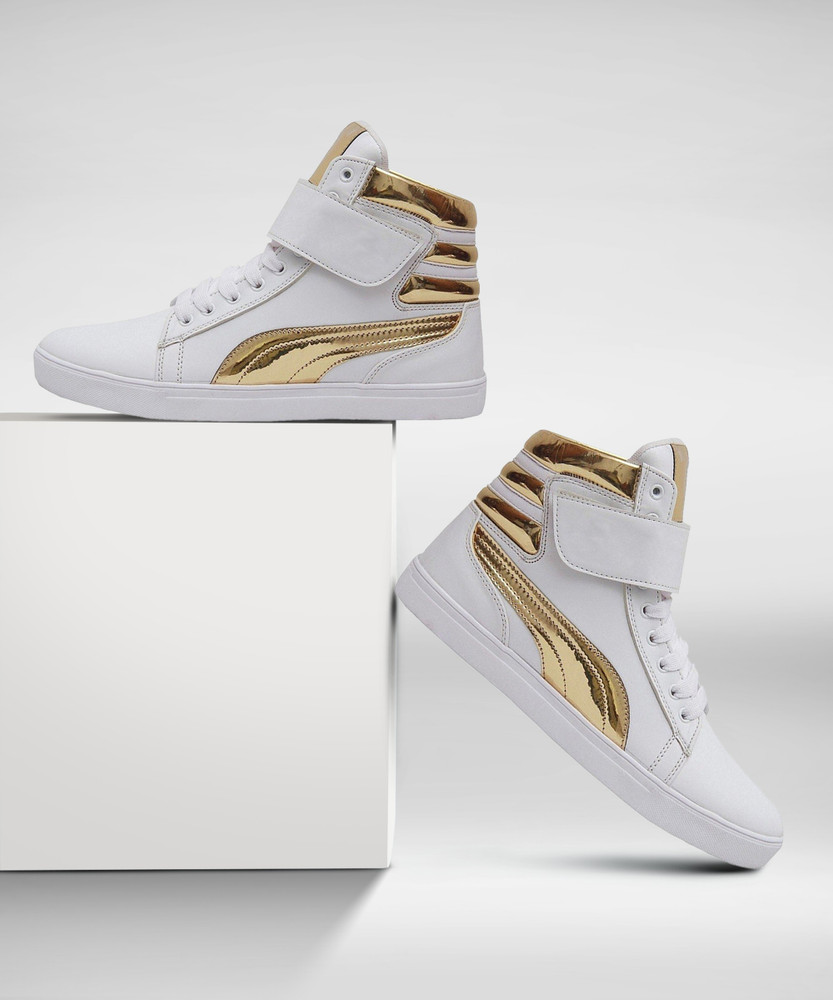white and golden shoes