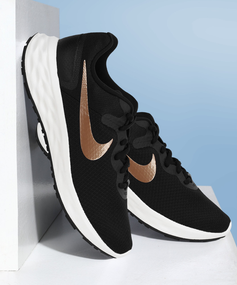 Nike revolution women's shoes hotsell