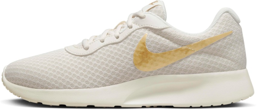 Nike tanjun clearance white gold