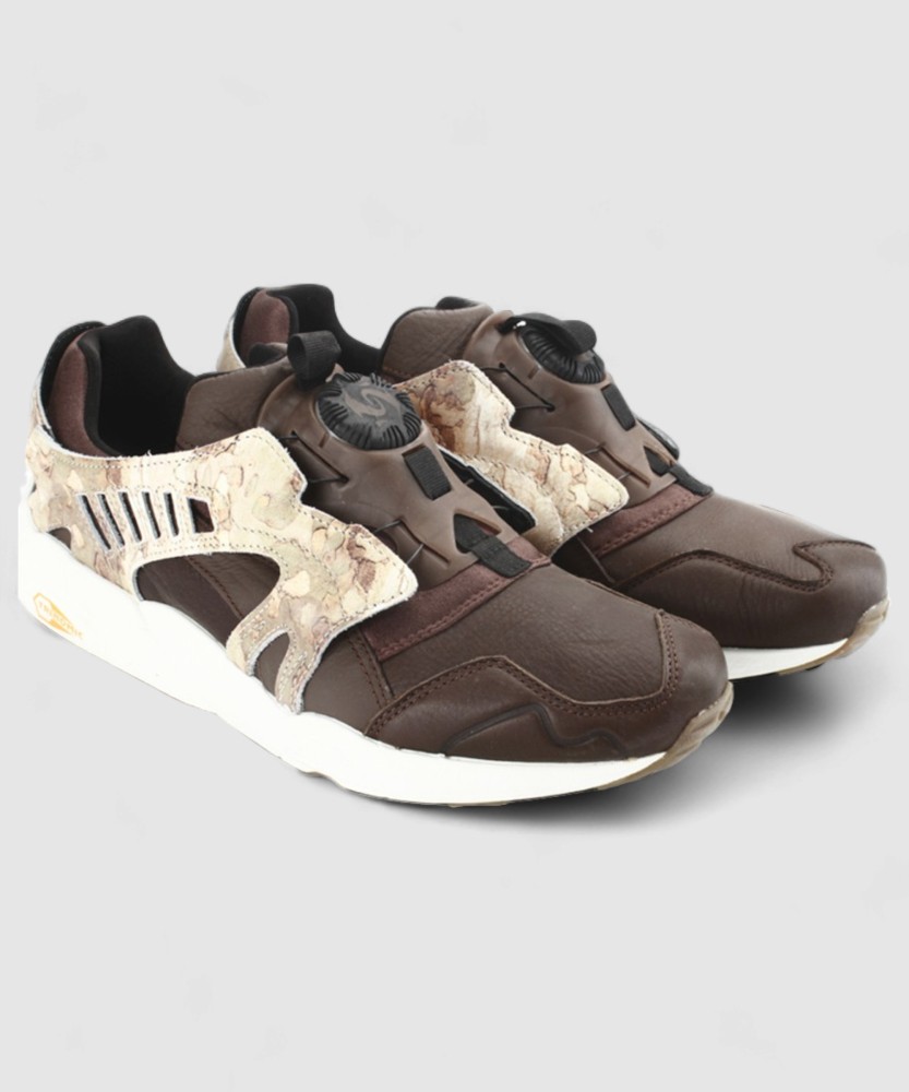 PUMA Trinomic Disc Camo Sneakers For Men Buy High Risk Red White Sea Pine Color PUMA Trinomic Disc Camo Sneakers For Men Online at Best Price Shop Online for Footwears