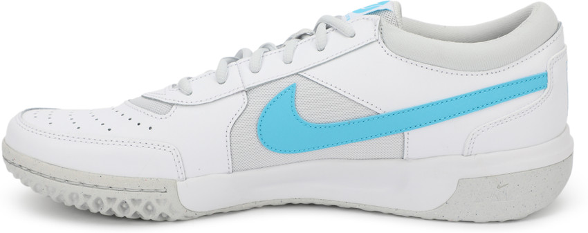 White nike shoes with blue swoosh sales