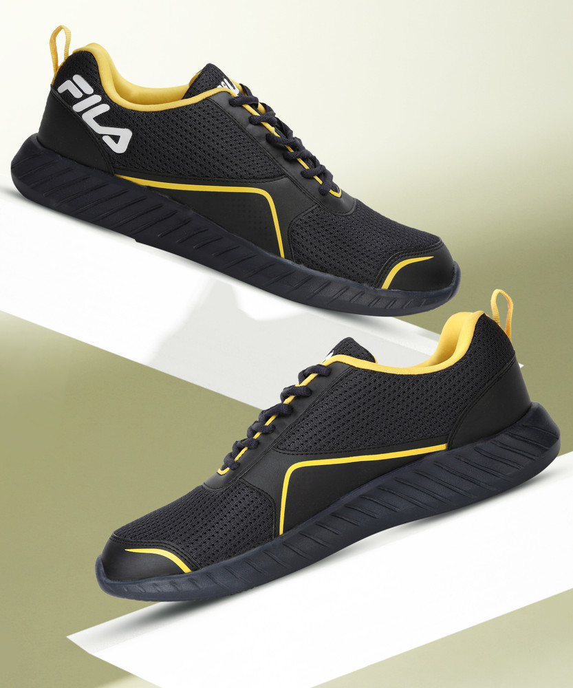 mustard yellow fila shoes
