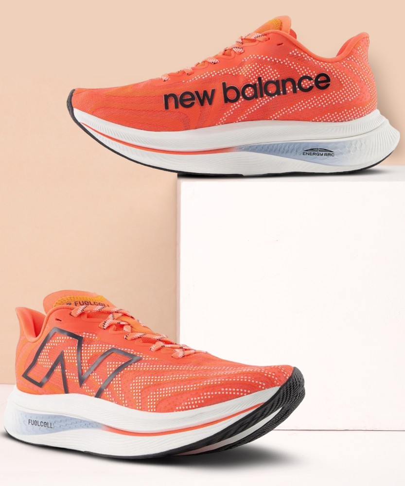 Mens orange new hot sale balance shoes