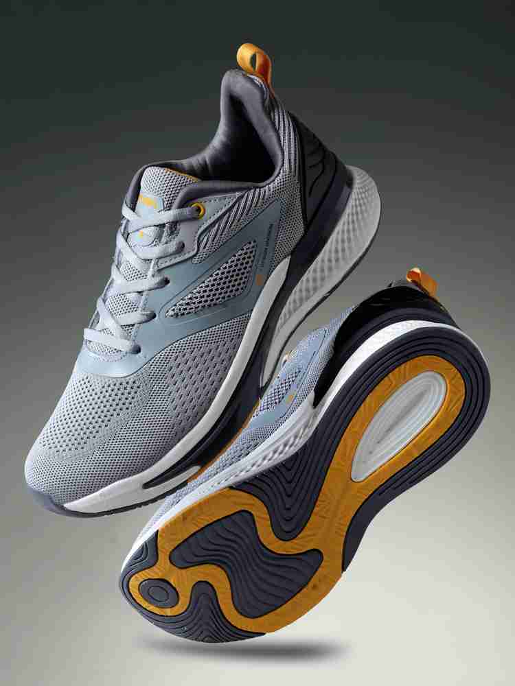 Action grey running shoes discount