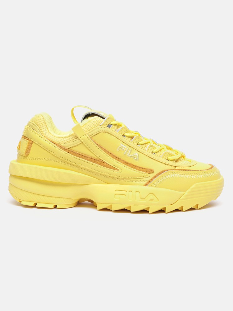 Yellow fila shoes on sale men