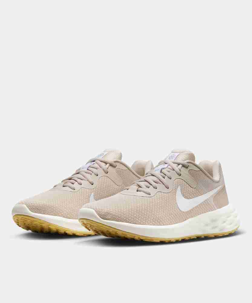 Beige color nike shoes sales