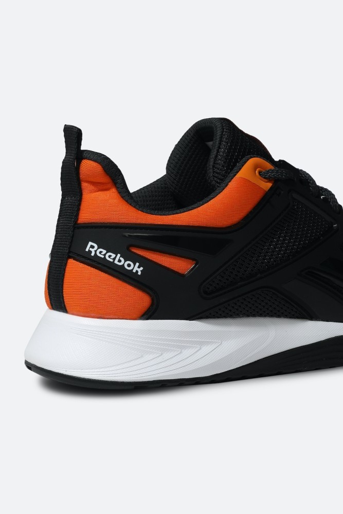 Reebok shoes with circles on sales bottom