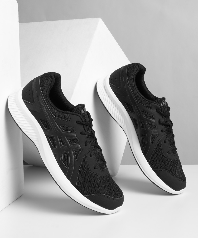 Asics stormer trainers mens online