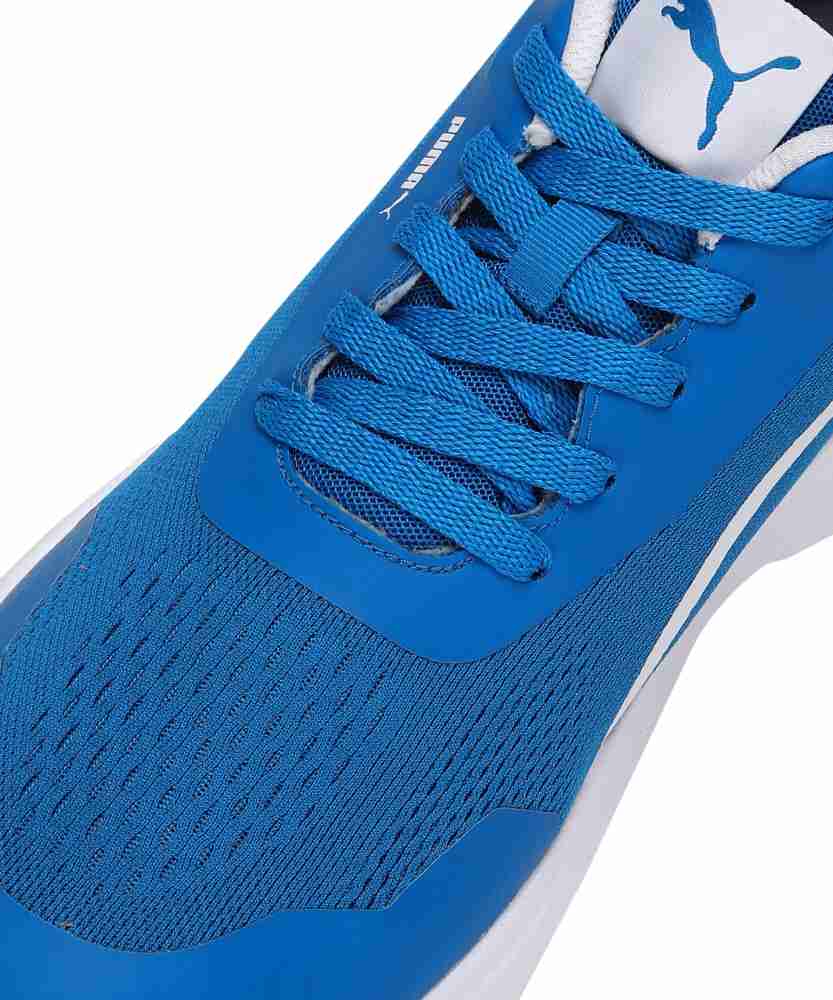 Blue puma racing top shoes