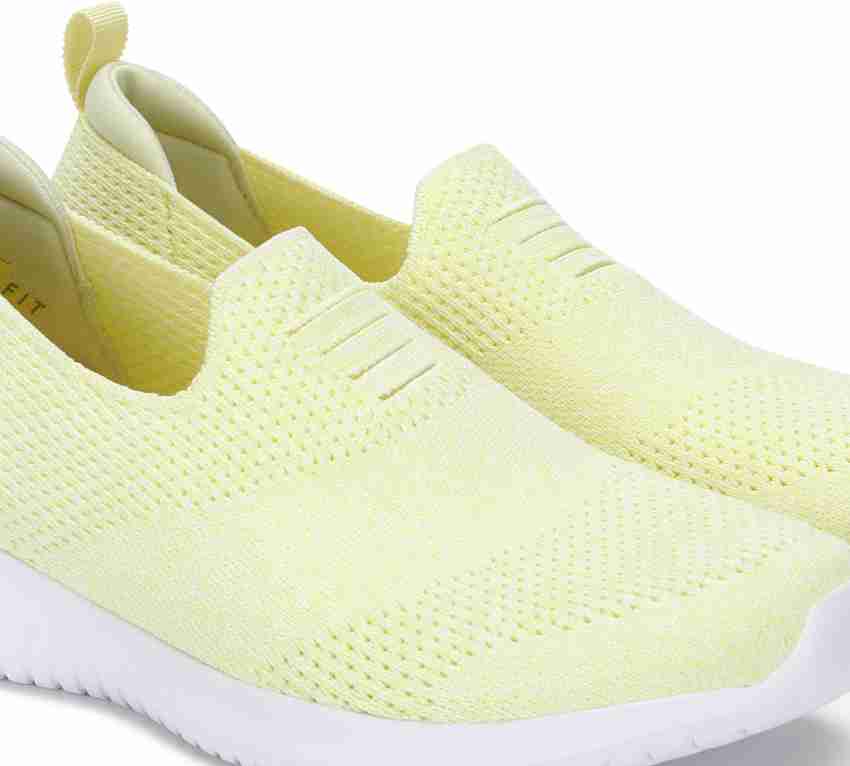 Womens yellow top skechers