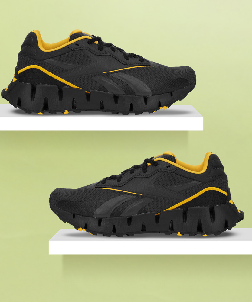 Reebok zig zag tennis shoes discount