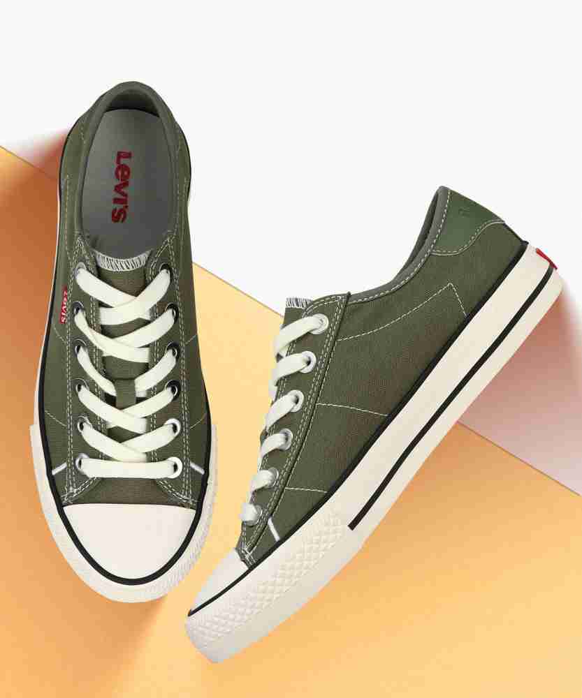 green levi shoes