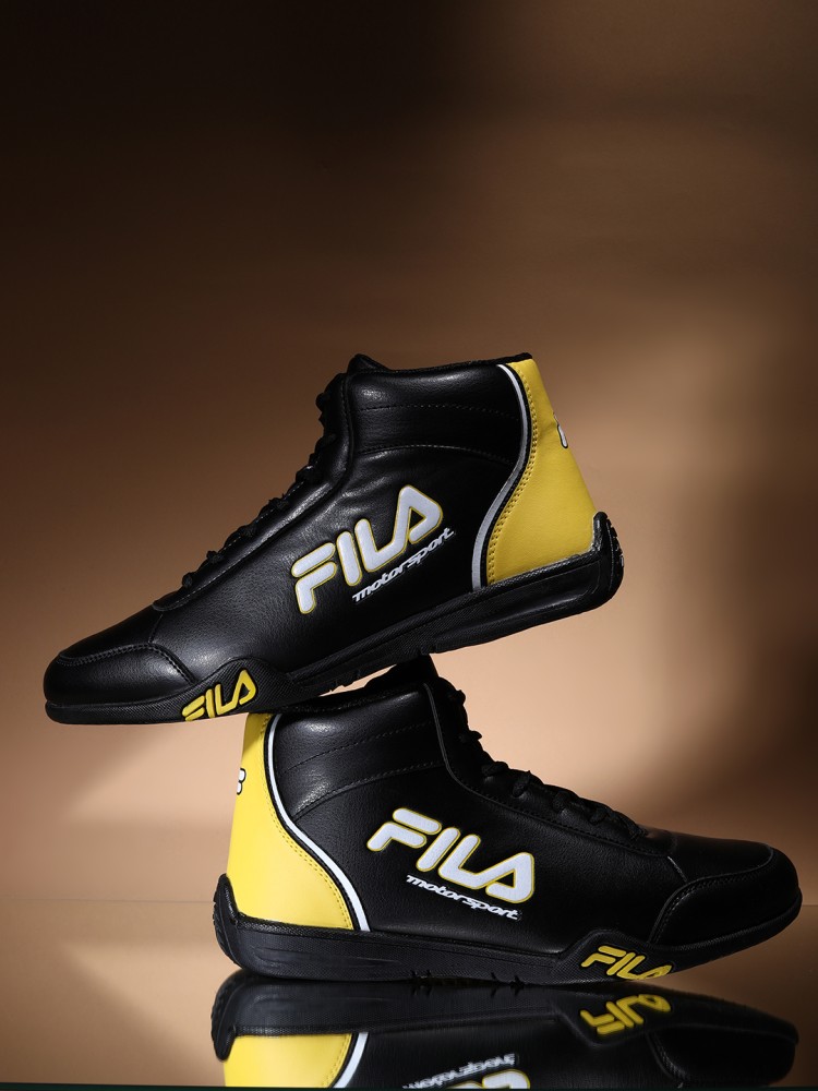 Fila shoes cheap black and yellow