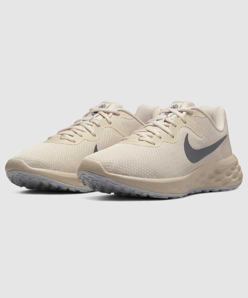 Nike beige running shoes best sale