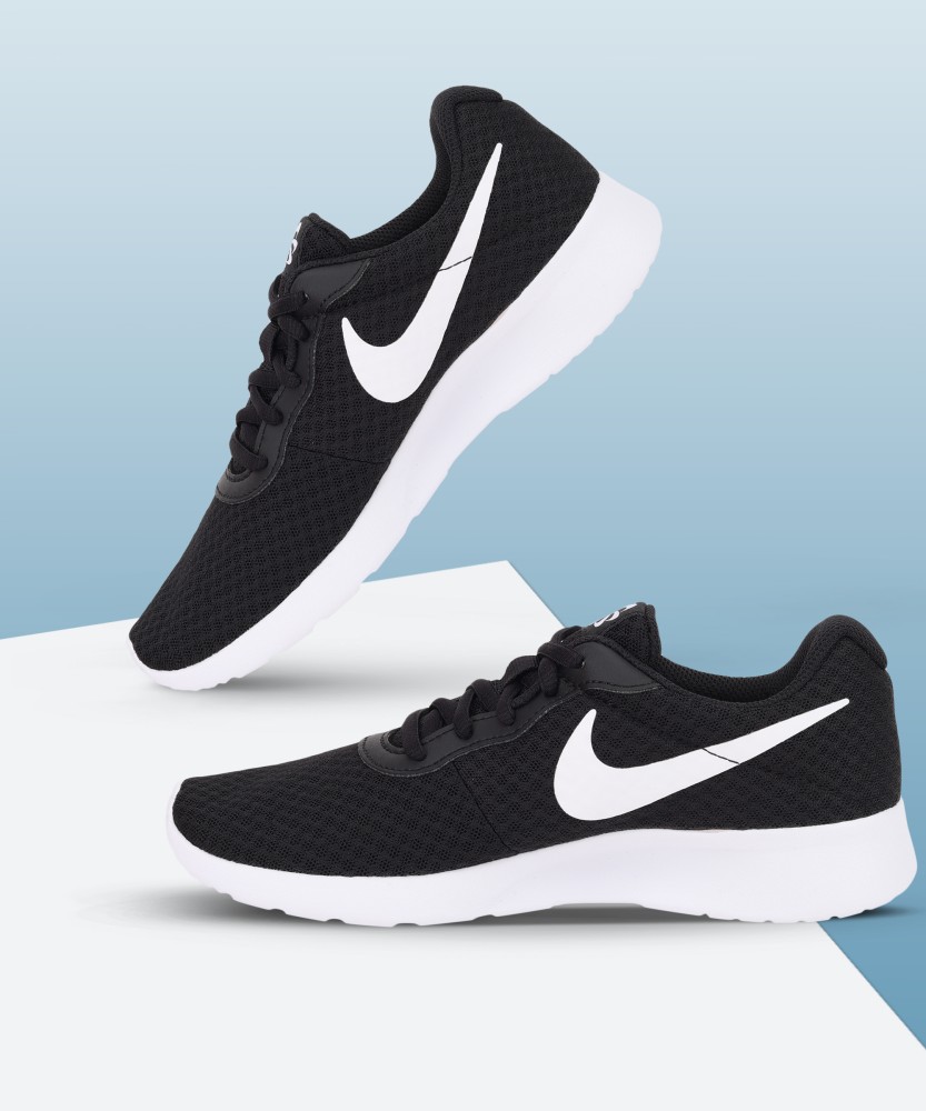 Women's nike best sale tanjun wide width