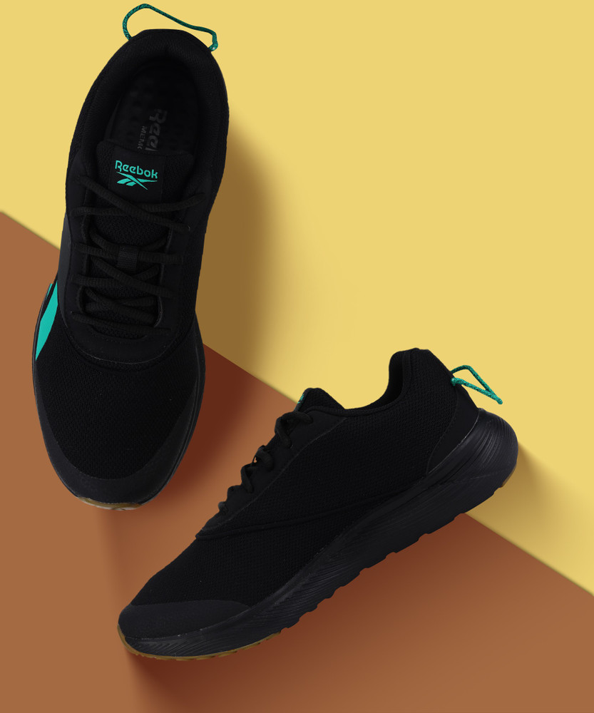 black and green reebok