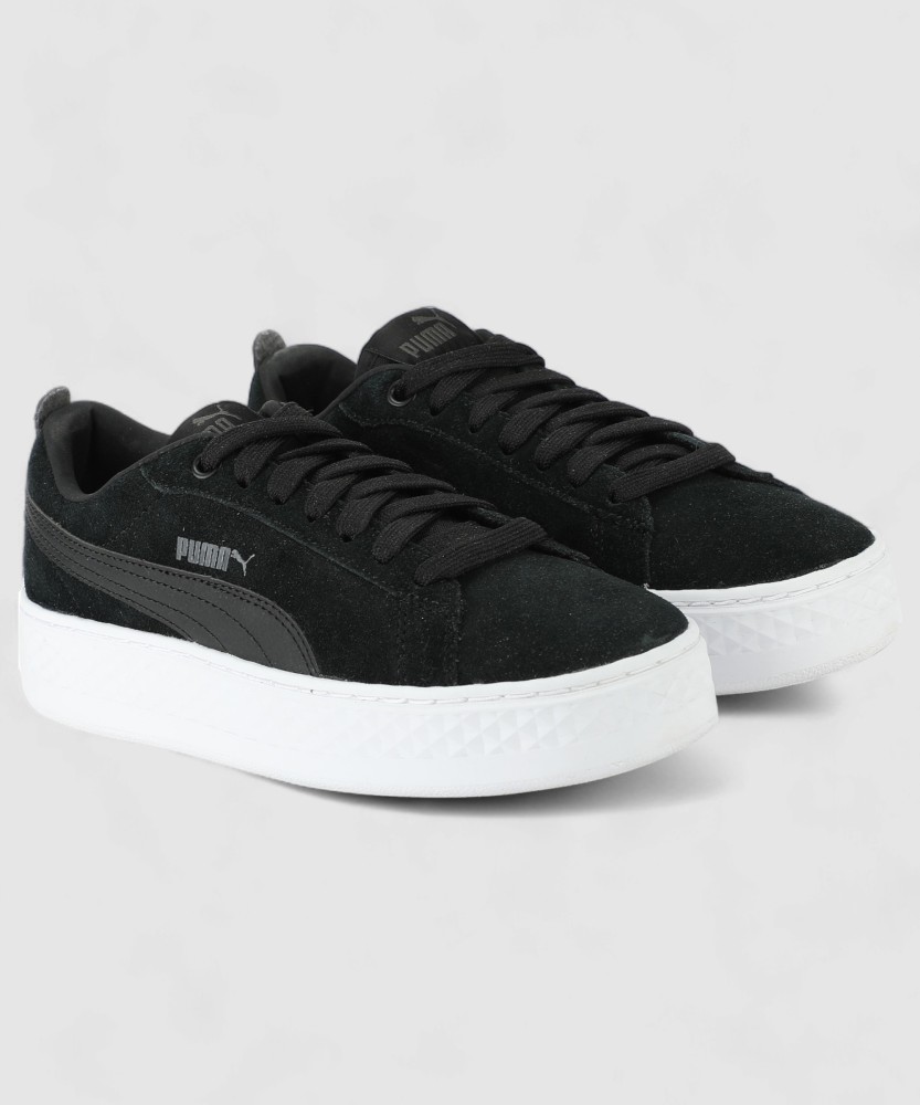 Black platform fashion pumas