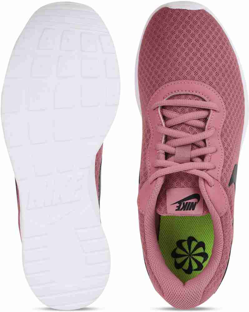 Pink nike tanjun hotsell shoes