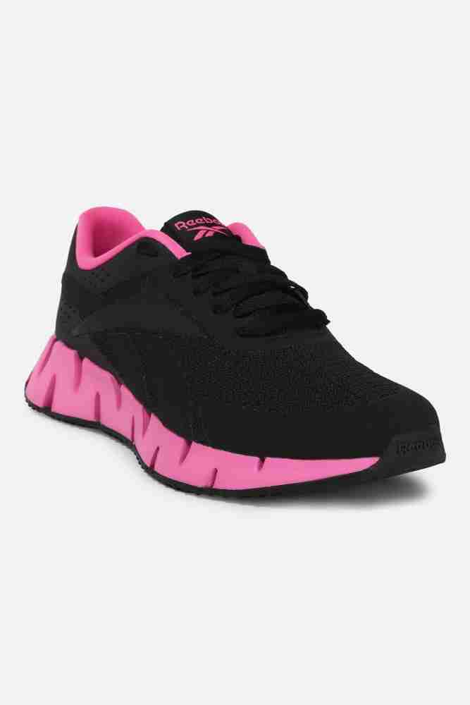 Womens pink hot sale reebok shoes