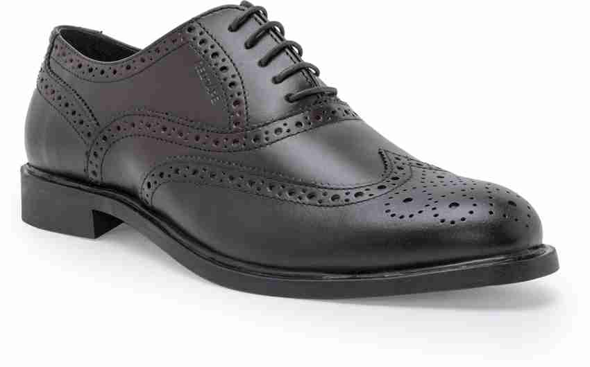 Red tape black 2025 brogue shoes