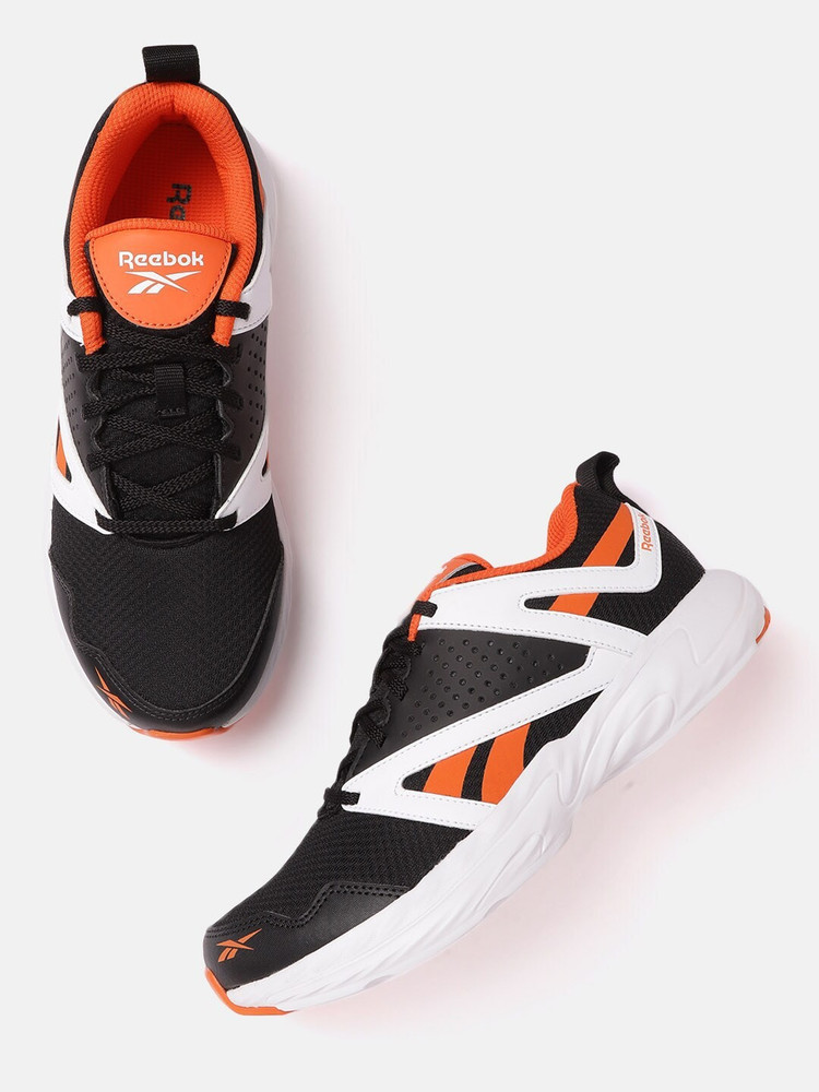black and orange reebok shoes