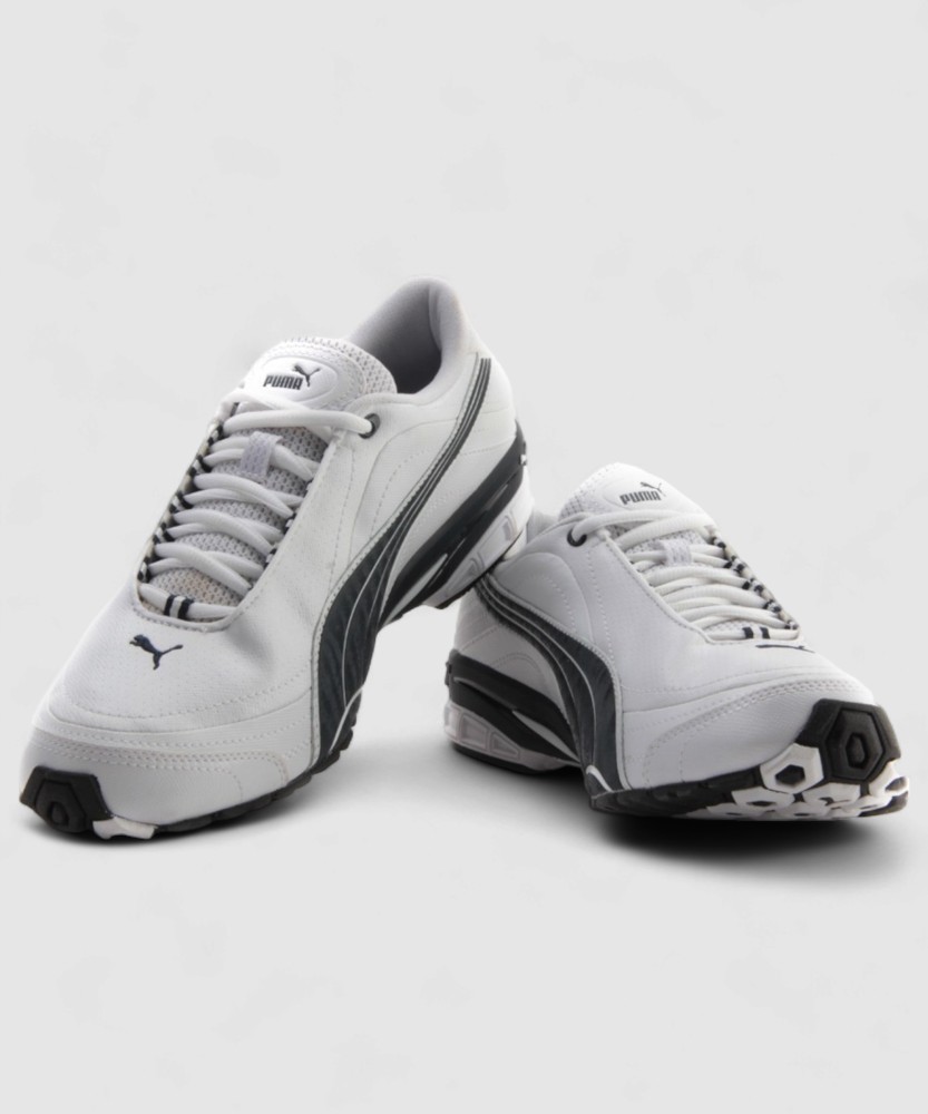 PUMA Tazon II Running Shoes For Men Buy White New Navy Puma Silver Color PUMA Tazon II Running Shoes For Men Online at Best Price Shop Online for Footwears in