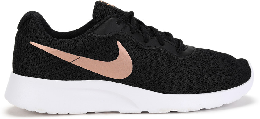 famous footwear nike tanjun