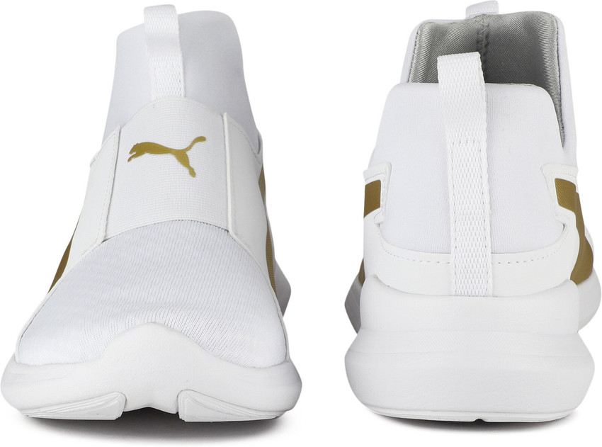 white and gold pumas