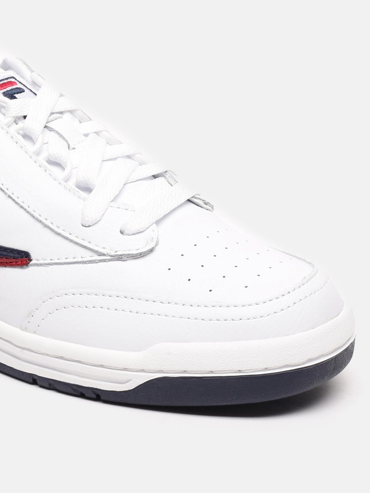 Fila all shop white sneakers