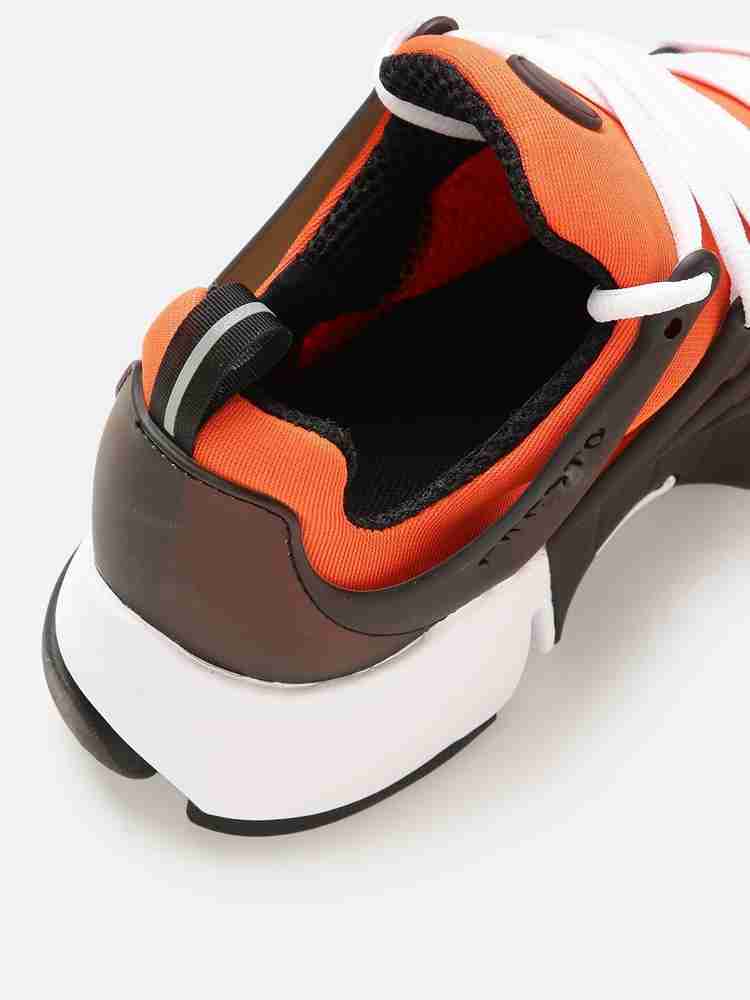 Nike orange shop shoes price