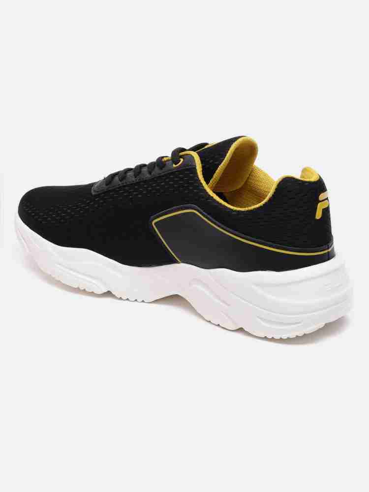 Fila black and gold 2025 shoes