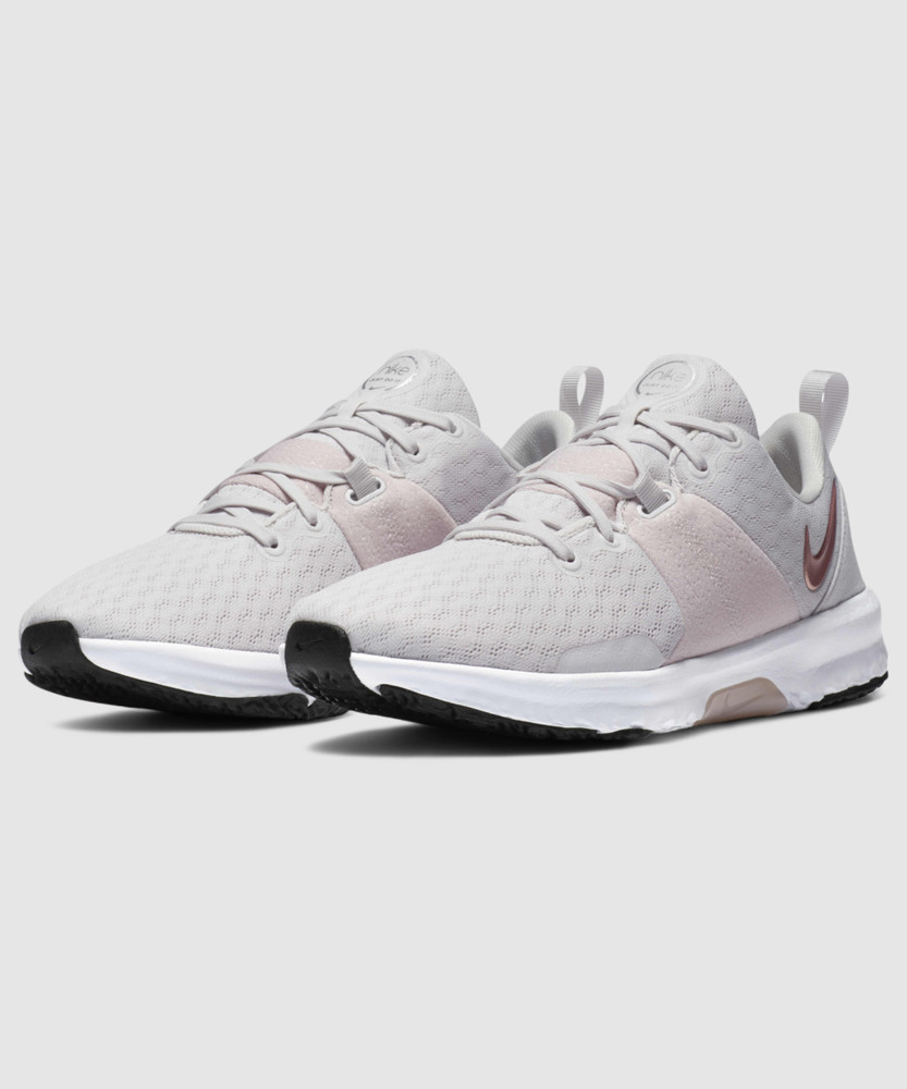 nike training renew fusion trainers in white and pink