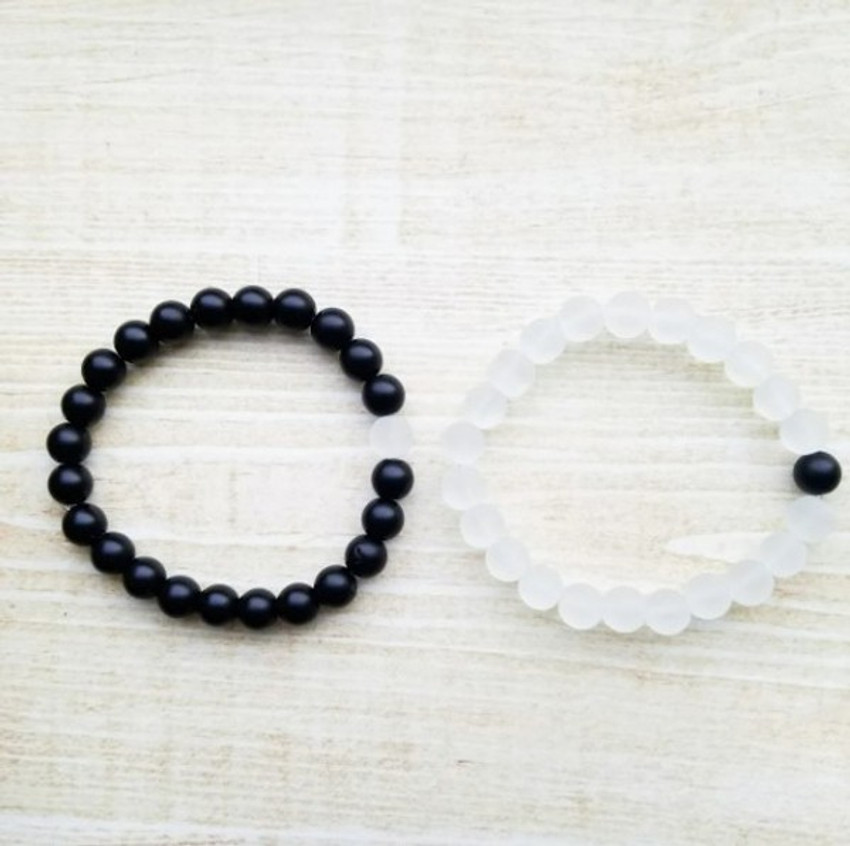 Matching black discount and white bracelets