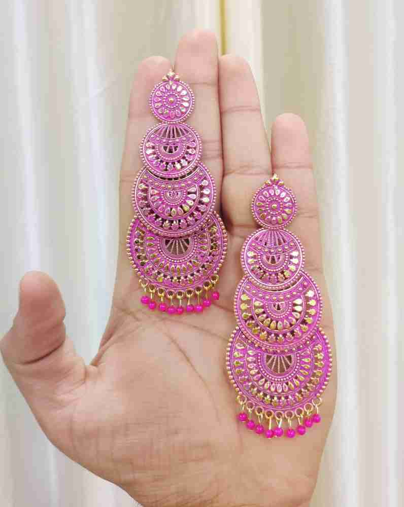 Layering earrings top