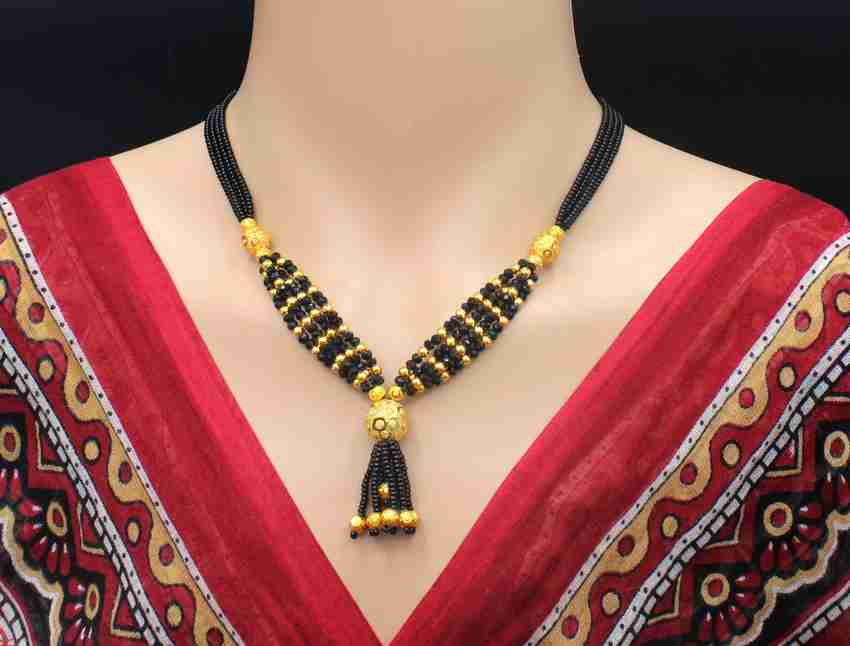 Thushi discount mangalsutra gold