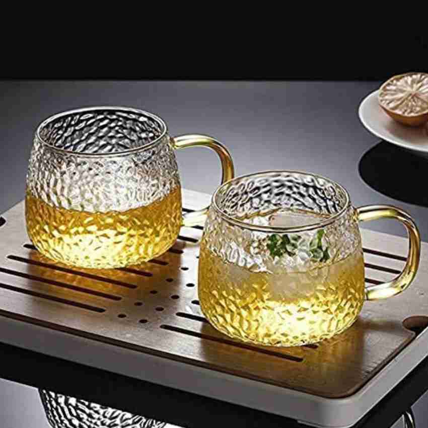 https://rukminim2.flixcart.com/image/850/1000/xif0q/shopsy-mug/m/g/9/transparent-glass-with-golden-handle-for-coffee-green-tea-lemon-original-imagk5bh2pmm3ty6.jpeg?q=20