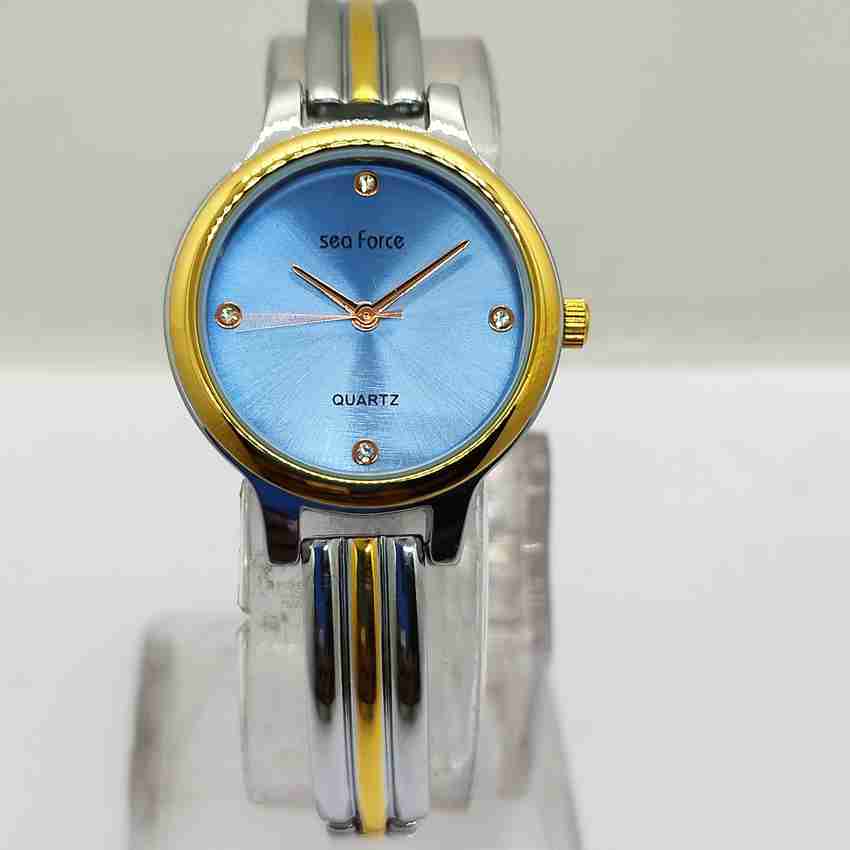 Sea force This Sea force watch comes with 1 Year Warranty on Manufacturing Defects. Fancy Blue Dial Silver Golden Mix Chain And Case Analog Watch For Women Buy Sea