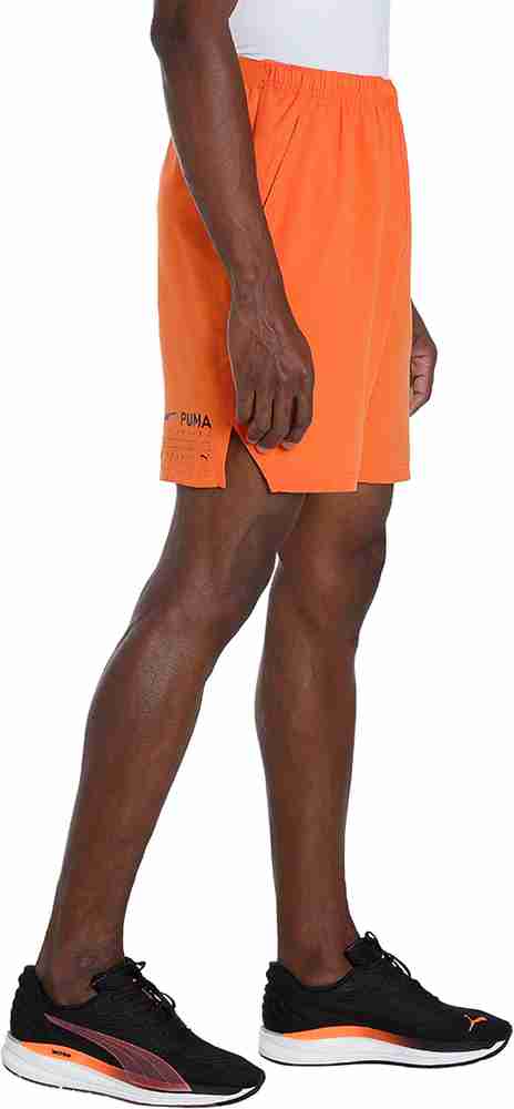 Orange puma shorts store