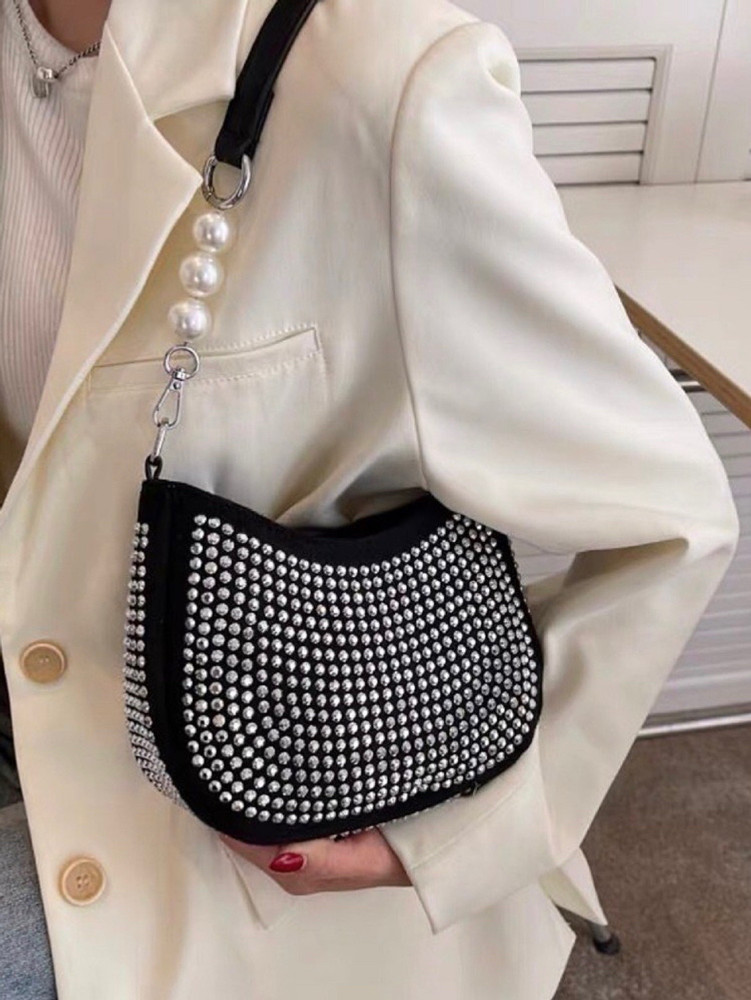 Detachable sling outlet bag